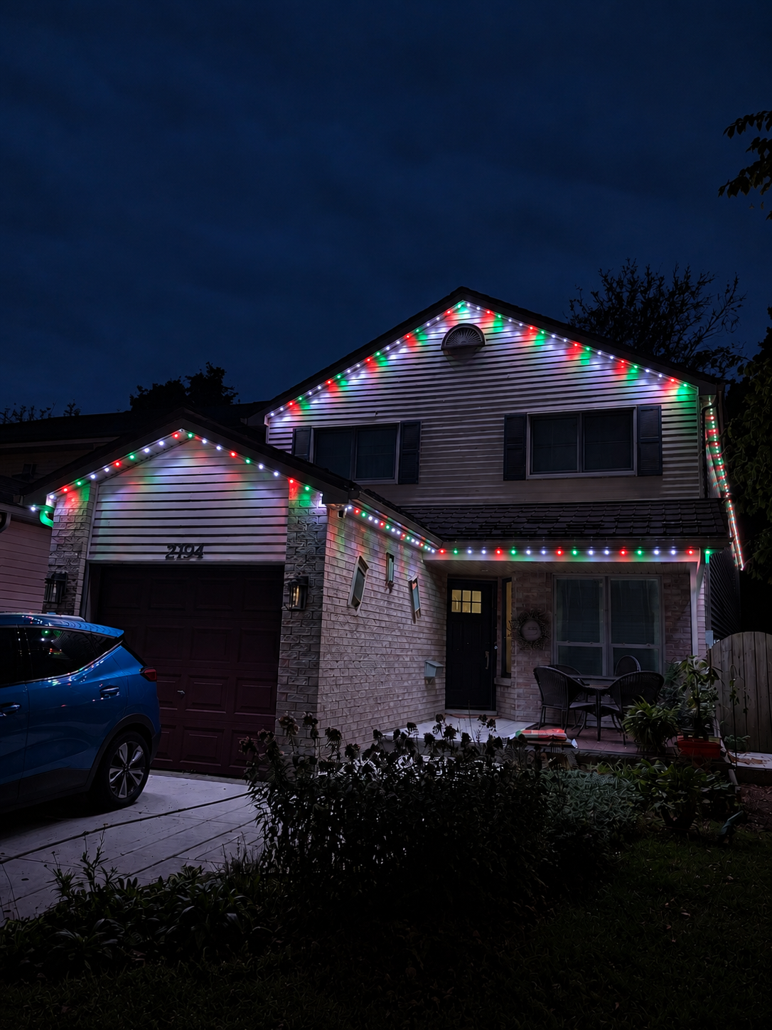 Imperial LED lighting — same house, red and green Christmas lights